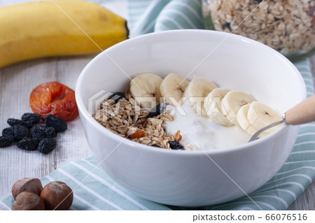 Granola with fruit and yogurt Granola with fruit and yogurt 66076516