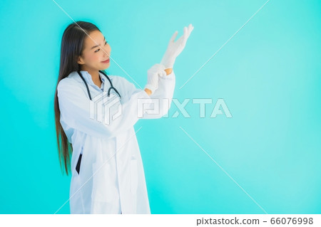 Portrait beautiful young asian doctor with glove Portrait beautiful young asian doctor with glove 66076998
