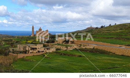 Aerial view over Basilica Ta Pinu in Gozo - a national shrine Aerial view over Basilica Ta Pinu in Gozo - a national shrine 66077046