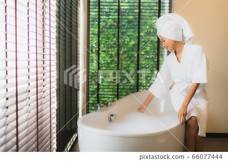 Portrait beautiful young asian woman with container cardboard parcel box Portrait beautiful young asian woman with container cardboard parcel box 66077444