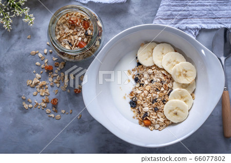 Granola with fruit and yogurt Granola with fruit and yogurt 66077802