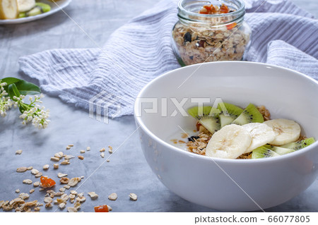 Granola with fruit and yogurt Granola with fruit and yogurt 66077805