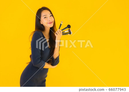Beautiful young asian woman use smart mobile phone Beautiful young asian woman use smart mobile phone 66077943