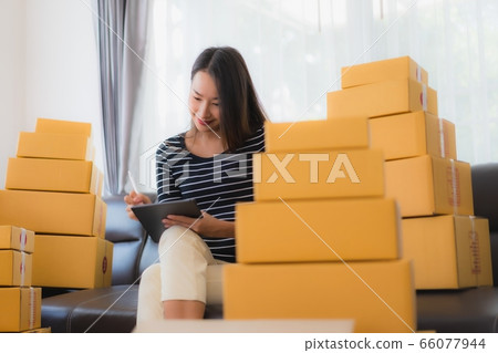 Beautiful young asian woman use smart mobile phone Beautiful young asian woman use smart mobile phone 66077944
