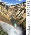 Rainbow and waterfall 66079381