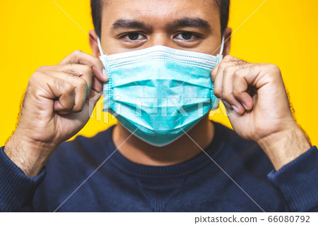 Man is wearing masks to protect against Corona virus Man is wearing masks to protect against Corona virus 66080792