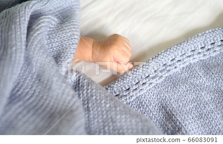 New born baby closeup hand. Love family healthcare 66083091