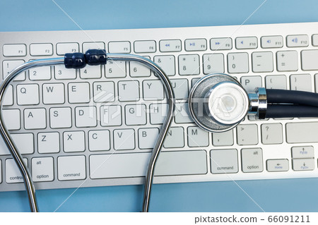 A stethoscope and a computer keyboard. Computer A stethoscope and a computer keyboard. Computer 66091211