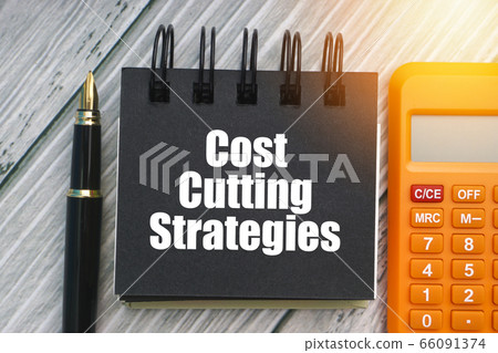 COST CUTTING STRATEGIES text with fountain pen, COST CUTTING STRATEGIES text with fountain pen, 66091374