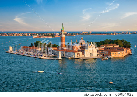 Aerial view of Venice lagoon with boats and San Giorgio di Maggiore church. Venice, Italy 66094022