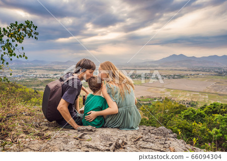 Happy tourists mom, dad and son travel to Vietnam. Travel to Asia concept. Traveling with kids 66094304