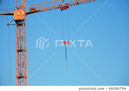 Construction Crane Against Blue Sky Construction Crane Against Blue Sky 66096794