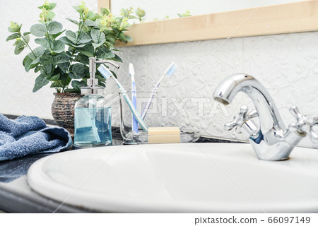 Bathroom set with toothbrushes, towels and soap Bathroom set with toothbrushes, towels and soap 66097149