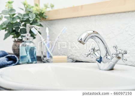 Vintage mixer tap in the bathroom 66097150