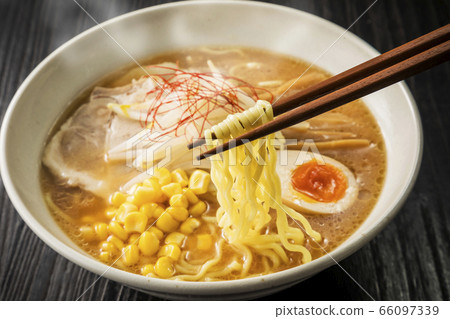 Miso corn ramen made from noodles with chopsticks Miso corn ramen made from noodles with chopsticks 66097339