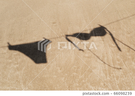bikini hanging on a clothes line on the beach bikini hanging on a clothes line on the beach 66098239