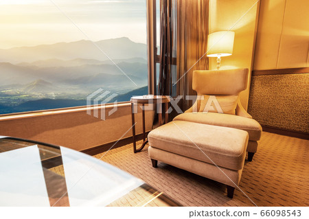 Sofa in living room and sunrise sky blackground Sofa in living room and sunrise sky blackground 66098543