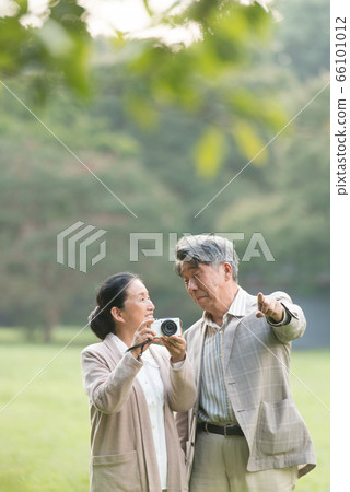 Senior couple walking Senior couple walking 66101012