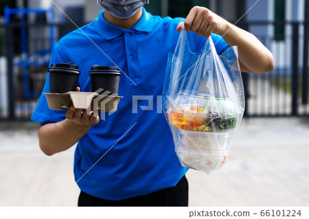 Asian delivery man delivering food, fruit, juice 66101224