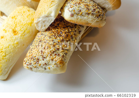 Various types of bread served on a wicker tray, Various types of bread served on a wicker tray, 66102319