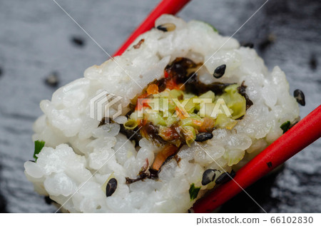 Close up of vegetable medley California roll, Close up of vegetable medley California roll, 66102830