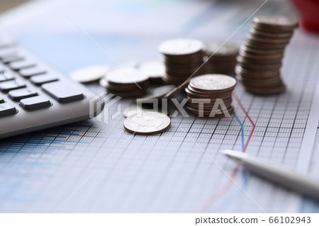 On color chart are coins and calculator with pen 66102943