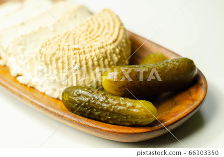 Smoked cottage cheese, brined cheese cut with Smoked cottage cheese, brined cheese cut with 66103350
