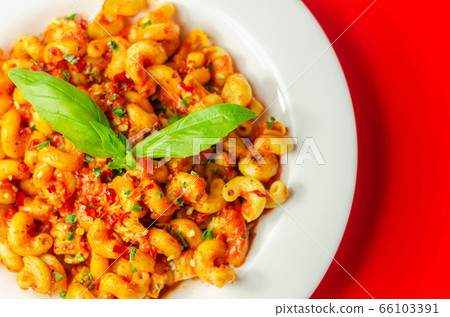 Cooked cellentani pasta with cooked chicken breast Cooked cellentani pasta with cooked chicken breast 66103391