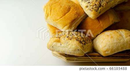Various types of bread served on a wicker tray, Various types of bread served on a wicker tray, 66103488