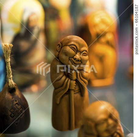 Sculptured wood Buddha. Wooden Buddha is the Sculptured wood Buddha. Wooden Buddha is the 66104187