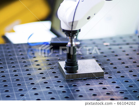 detail of 3d printer printing a plastic piece detail of 3d printer printing a plastic piece 66104202