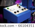 The red emergency button or stop button for Hand 66104351