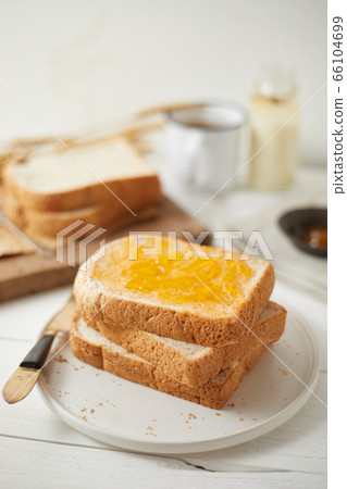 Delicious toasts with sweet jams. 66104699