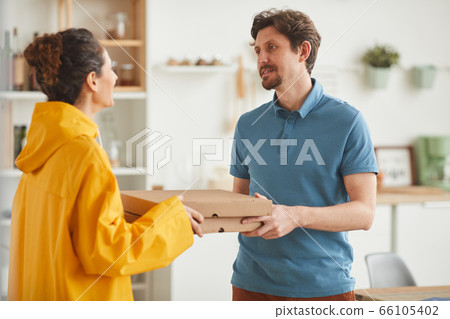 Delivery of pizza to home Delivery of pizza to home 66105402