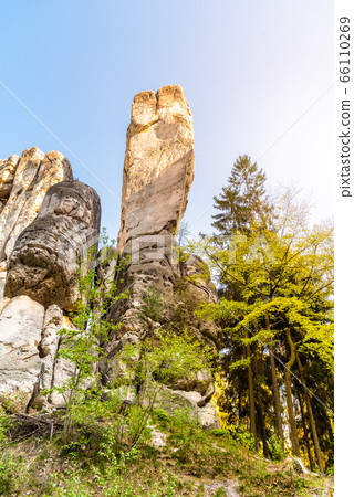 Monumental sandstone rock formation in the miidle of spring forest of Bohemian Paradise, Czech: Cesky raj, Czech Republic Monumental sandstone rock formation in the miidle of spring forest of Bohemian Paradise, Czech: Cesky raj, Czech Republic 66110269