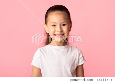 Happy asian kid posing and looking at camera Happy asian kid posing and looking at camera 66111523
