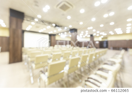 Blurred photo of empty interior of conference holl Blurred photo of empty interior of conference holl 66112065