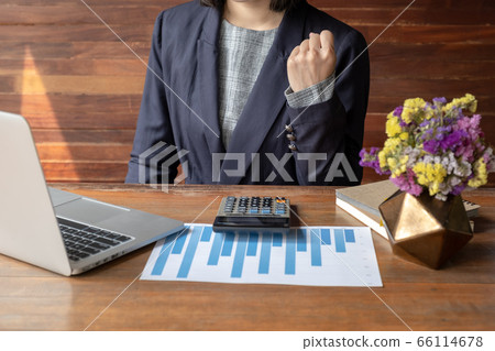 Picture of business woman pretending wisp hand because work success 66114678