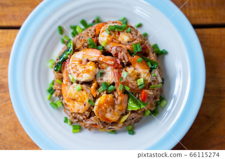 Khao Pad Tom Yum Goong spicy fried rice with Khao Pad Tom Yum Goong spicy fried rice with 66115274