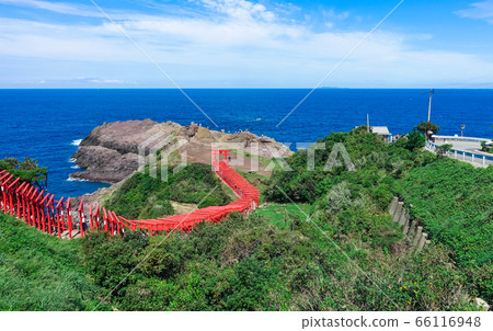 Motonosumi Shrine (Motonosumi Inari Shrine) lined with red torii gates against the blue Sea of Japan Nagato City, Yamaguchi Prefecture Motonosumi Shrine (Motonosumi Inari Shrine) lined with red torii gates against the blue Sea of Japan Nagato City, Yamaguchi Prefecture 66116948