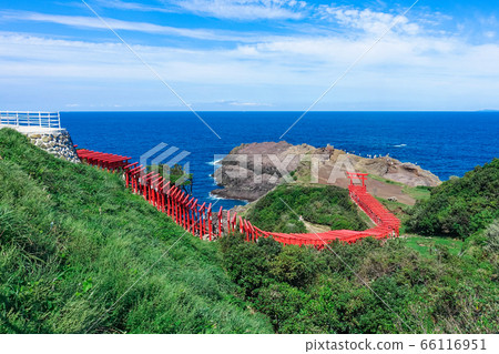 Motonosumi Shrine (Motonosumi Inari Shrine) with red torii gates on the background of the blue Sea of Japan Nagato City, Yamaguchi Prefecture Motonosumi Shrine (Motonosumi Inari Shrine) with red torii gates on the background of the blue Sea of Japan Nagato City, Yamaguchi Prefecture 66116951