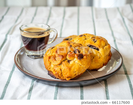 Chewy chocolate chip soft cookies with cup of Chewy chocolate chip soft cookies with cup of 66117600