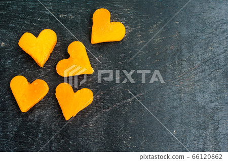 Papaya cutting shape of the heart. smoothies. The flat lying structure. love concept. Valentine's Day Papaya cutting shape of the heart. smoothies. The flat lying structure. love concept. Valentine's Day 66120862