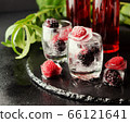 Summer berry lemonade with frozen berries 66121641