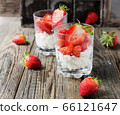 red ripe strawberry in with cottage cheese or 66121647