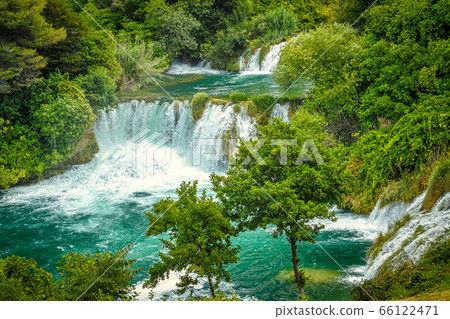 Waterfalls Skradinski Buk in The Krka National park. Waterfalls Skradinski Buk in The Krka National park. 66122471