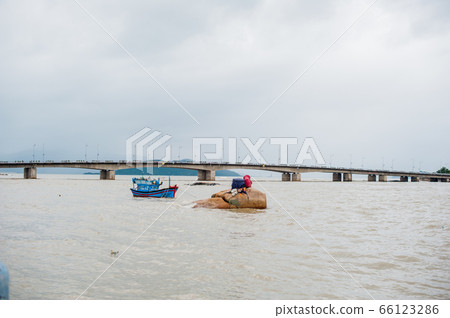 Blue Vietnamese boats on the river Blue Vietnamese boats on the river 66123286