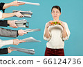 woman is about to take lunch, but colleagues are 66124736