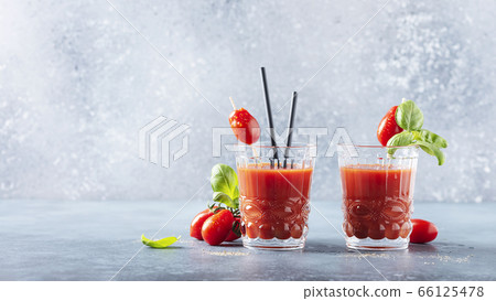 Vegan tomato juice with basil and peppe Vegan tomato juice with basil and peppe 66125478