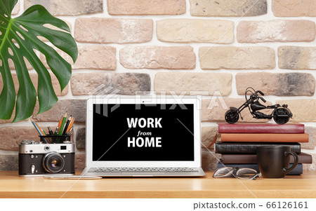 Stylish home studio workspace with laptop and 66126161
